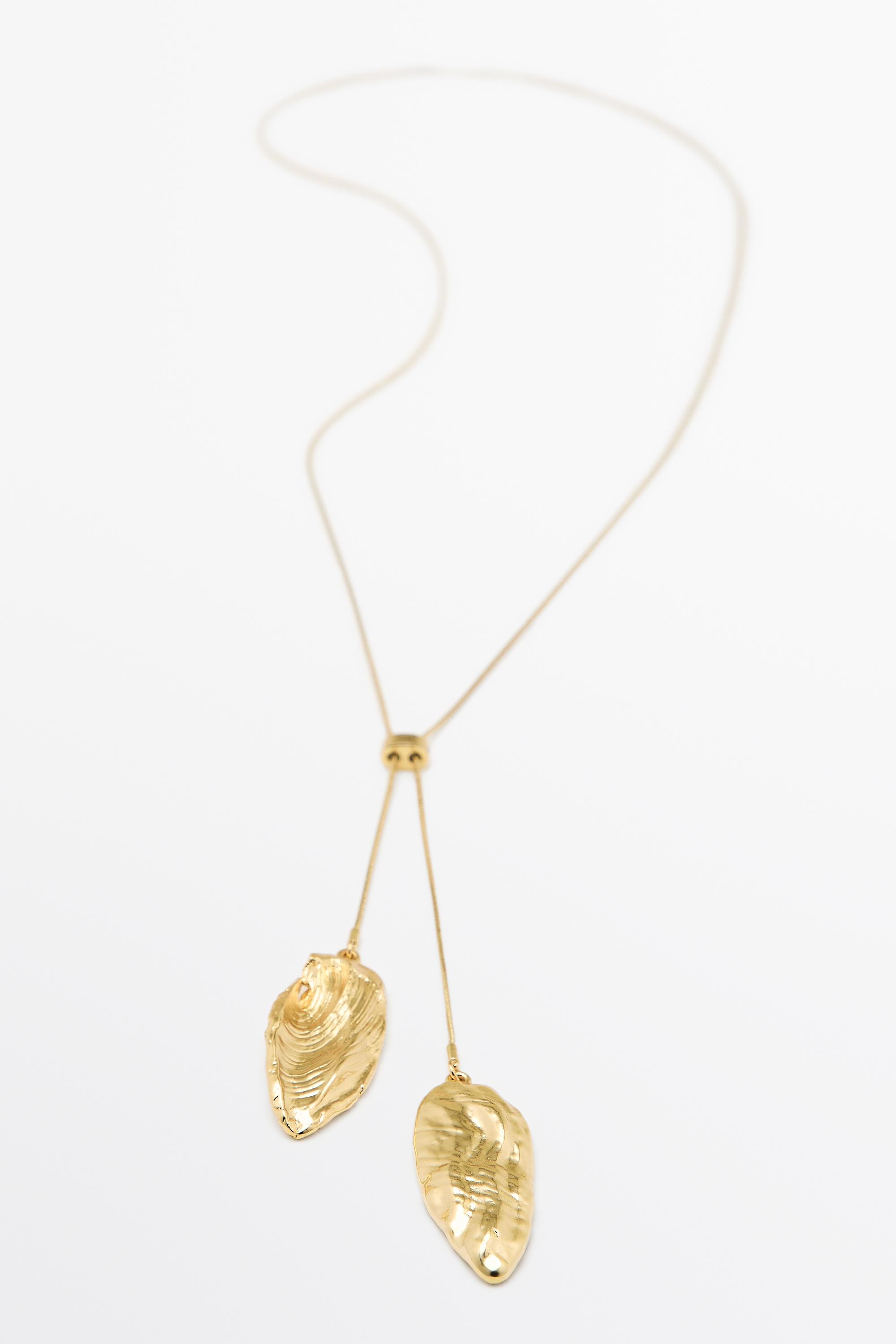 Adjustable necklace with textured pieces